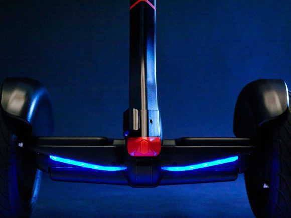 High-tech Ninebot Segway miniPRO with LED lights and sturdy wheels.
